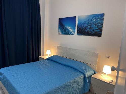 Ένα ή περισσότερα κρεβάτια σε δωμάτιο στο Luciana2