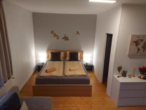 Postel nebo postele na pokoji v ubytování Golden Base