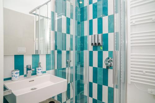 Koupelna v ubytování Acquamarina Apartment