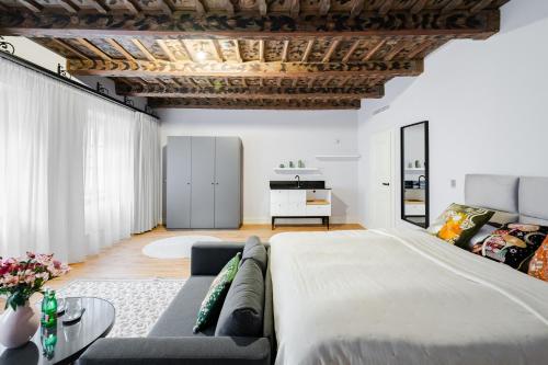 En eller flere senge i et værelse på Bohemia Boutique Hotel Prague