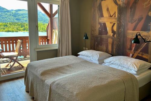 Giường trong phòng chung tại Strandhotel Margaretha