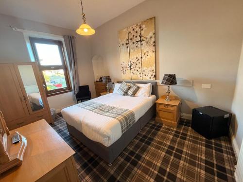 Ένα ή περισσότερα κρεβάτια σε δωμάτιο στο Westend Hotel & Bar