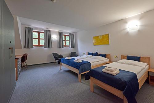 Postel nebo postele na pokoji v ubytování Benedikt Most