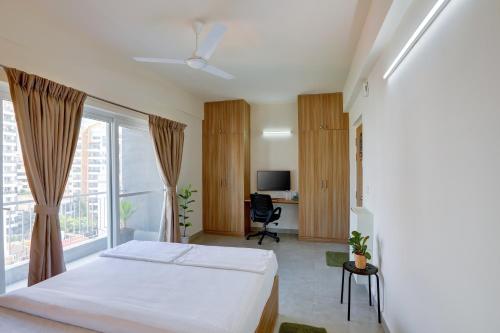 Postel nebo postele na pokoji v ubytování Acasa Suites - ITPL Whitefield, Near Manipal Hospital