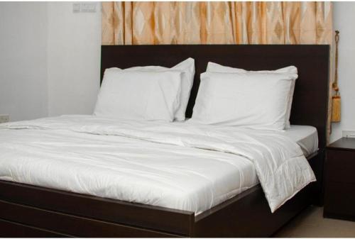 Postel nebo postele na pokoji v ubytování Epic apartment - lugbe