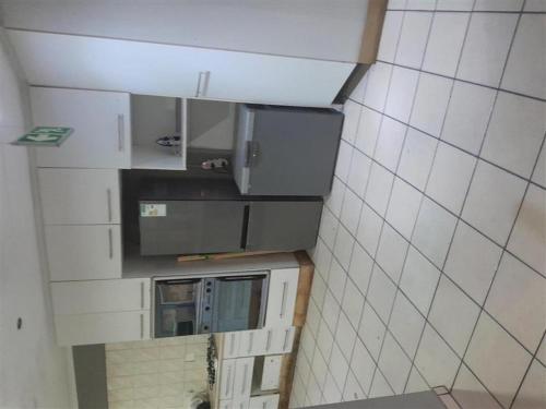 Kuchyň nebo kuchyňský kout v ubytování Beach View Apartment