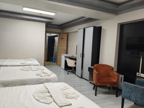 Postel nebo postele na pokoji v ubytování Retrol Butik Hotel