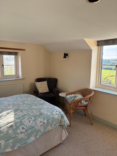 Ένα ή περισσότερα κρεβάτια σε δωμάτιο στο Farmhouse studio near Shrewsbury