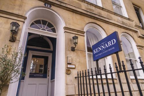 a blue sign on the side of a building at The Kennard in Bath