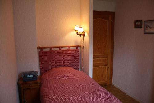 Llit o llits en una habitació de Chambre d'hôtes à Vecoux