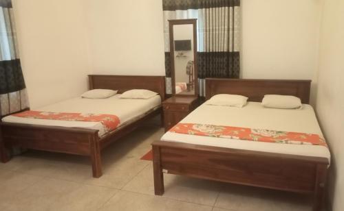 Postel nebo postele na pokoji v ubytování Hotel Galaxy