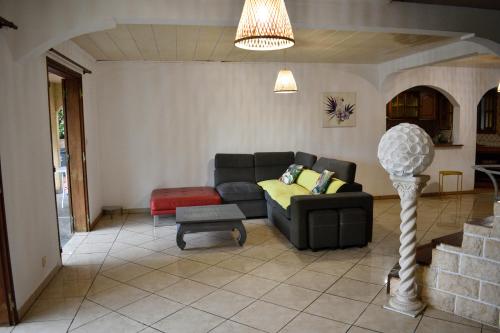 Et opholdsområde på Location saisonnière Villa