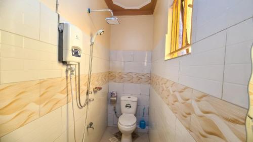 Baðherbergi á Nik Suites Nangabo