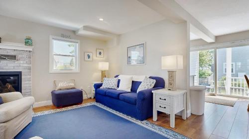 En eller flere senge i et værelse på Seas the Day by Bayley Vacation Rentals