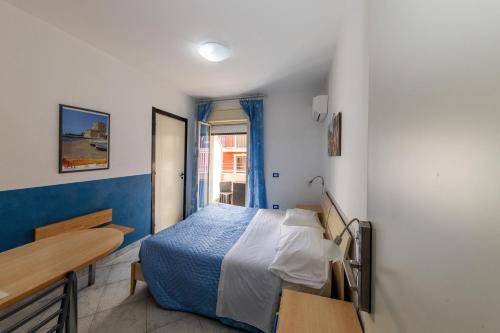 Кровать или кровати в номере B&B Brezza Marina & Ristorante Shoreline