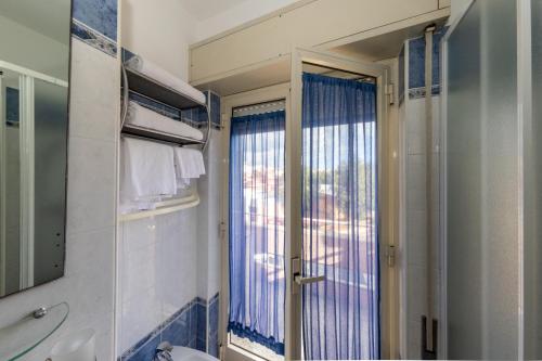 Ванная комната в B&B Brezza Marina & Ristorante Shoreline