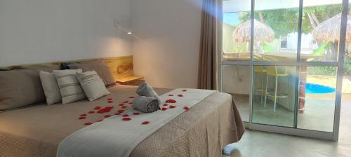 Postel nebo postele na pokoji v ubytování Cris Beach House