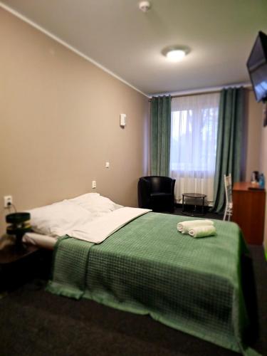 Ένα ή περισσότερα κρεβάτια σε δωμάτιο στο PLATINIUM House ex Royal House