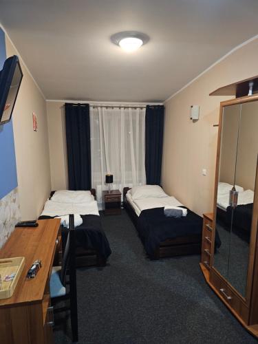 Ένα ή περισσότερα κρεβάτια σε δωμάτιο στο PLATINIUM House ex Royal House