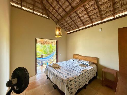 En eller flere senge i et værelse på Kanaloa Village 01