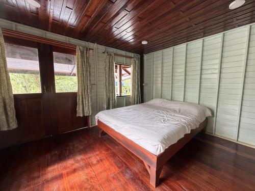 En eller flere senge i et værelse på Chansea Resort Chanthaburi Thailand