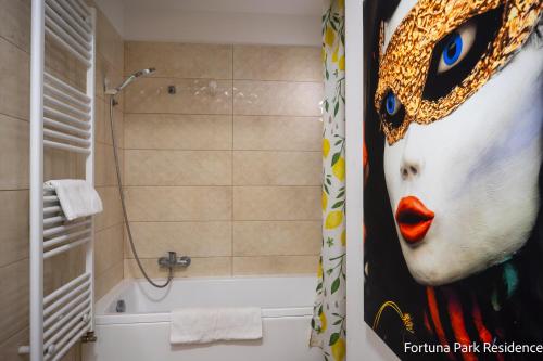 Ένα μπάνιο στο Fortuna Park Residence & Private Parking