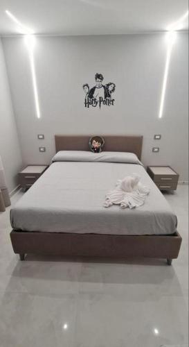 Ένα ή περισσότερα κρεβάτια σε δωμάτιο στο B&B Grifondoro