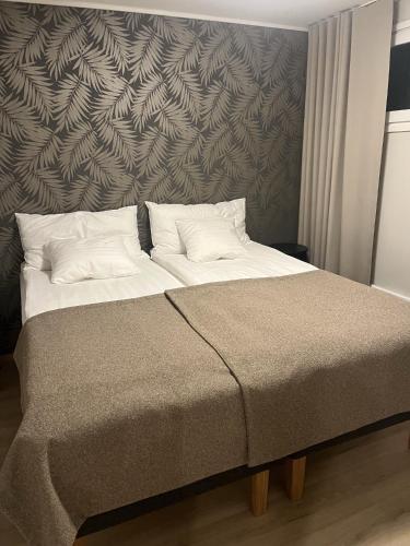 Llit o llits en una habitació de Villa Lippo