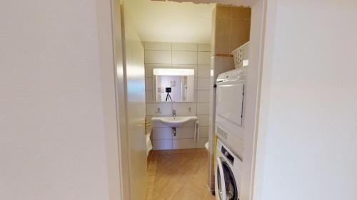 Et badeværelse på 2-Bedroom, 2-Bathroom Apartment, Parking & Lake View - Pully - CD20-3F