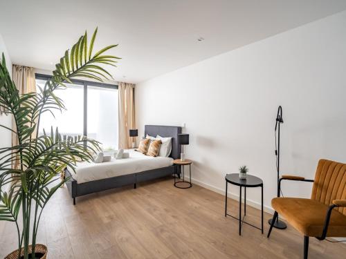 En eller flere senge i et værelse på Akivillas Sintra Chill