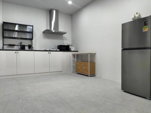 Kuchyň nebo kuchyňský kout v ubytování Ck Home Lanta