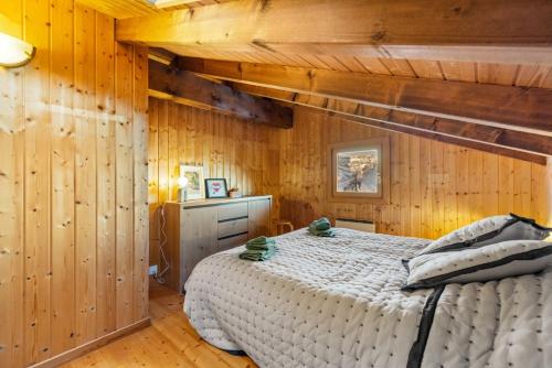 Giường trong phòng chung tại Le Petiot - mini chalet - maxi douceur - 4personnes