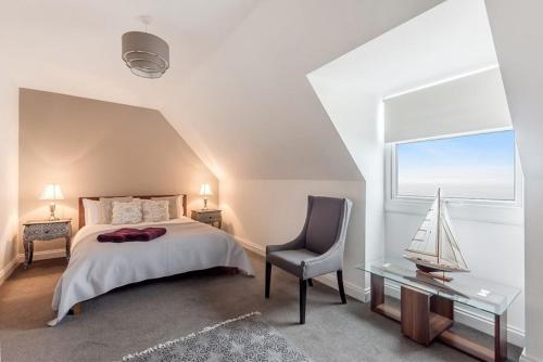 Ένα ή περισσότερα κρεβάτια σε δωμάτιο στο The Loft