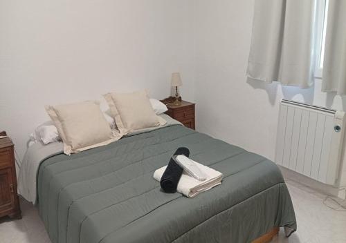 En eller flere senge i et værelse på Chalet antiguo reformado