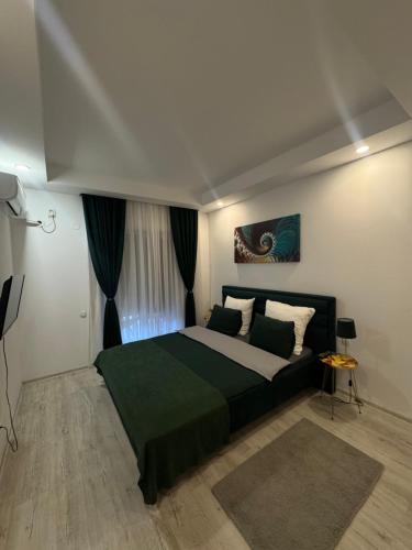 Ένα ή περισσότερα κρεβάτια σε δωμάτιο στο Lucas investment L3 -104