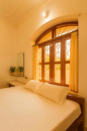 Ένα ή περισσότερα κρεβάτια σε δωμάτιο στο Entire Villa in Darbhanga