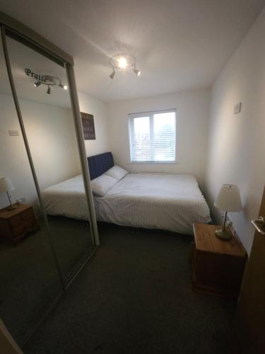 Ένα ή περισσότερα κρεβάτια σε δωμάτιο στο Two Bedroom Apartment in Central Northampton