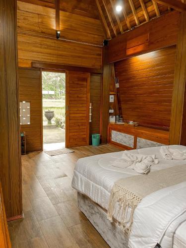 Postel nebo postele na pokoji v ubytování tarotours accommodation