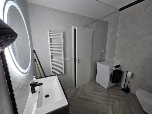 Et badeværelse på Gold Residence Apartman