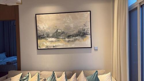 En eller flere senge i et værelse på Apartment suite