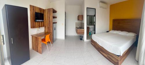 Een bed of bedden in een kamer bij Bellooceano