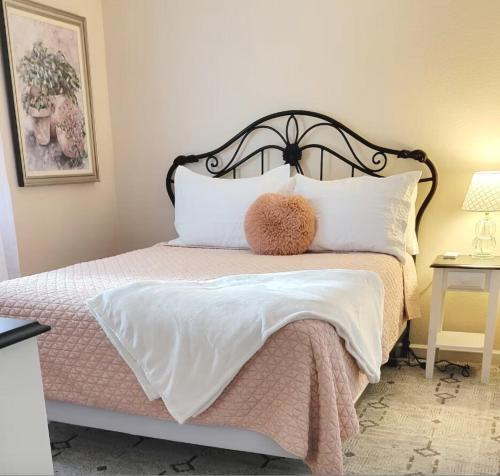 a bedroom with a bed with a teddy bear on it at The Great Escape, Black Mountain in Black Mountain