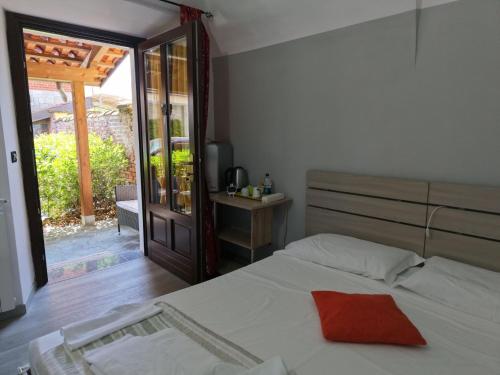 Кровать или кровати в номере La Cascina