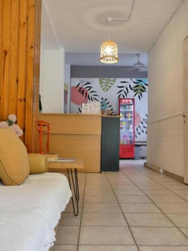 En eller flere senge i et værelse på Hostel IL POINT