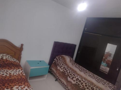 En eller flere senge i et værelse på GRAN departamento centrico