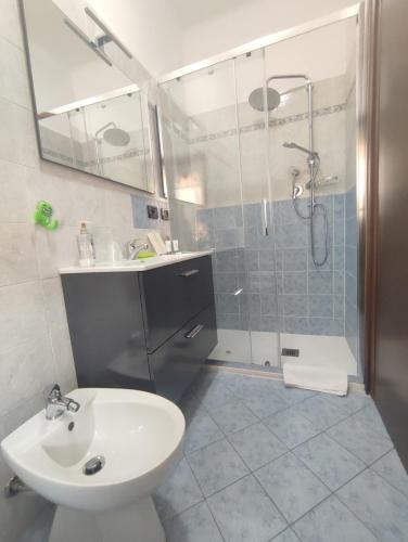 a bathroom with a shower and a toilet and a sink at La Cascina in Agliè