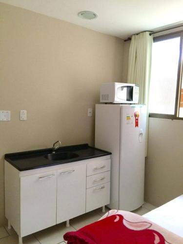 Η κουζίνα ή μικρή κουζίνα στο Hotel Comendador Express