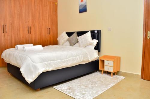 Ένα ή περισσότερα κρεβάτια σε δωμάτιο στο Carlton Stays