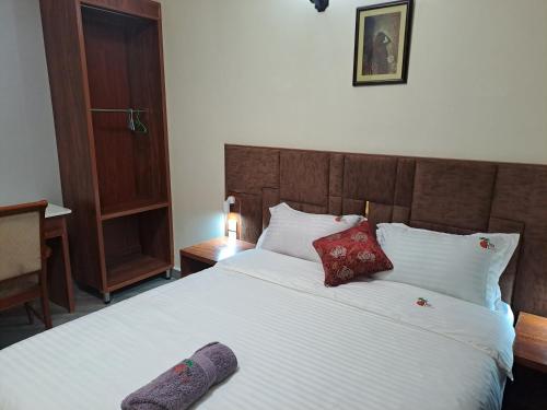 Postel nebo postele na pokoji v ubytování Ritz Motel