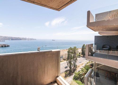 a view of the ocean from the balcony of a building at HOM l Estudio con Vista al mar 3PAX in Valparaíso